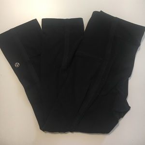 Two pairs of older lulus. One pant one crop.